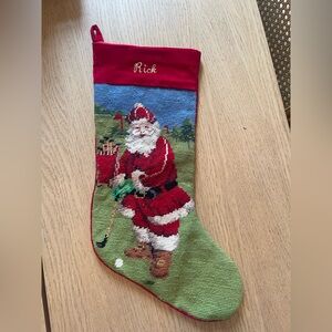 Needlepoint Santa stocking engraved with “Rick”